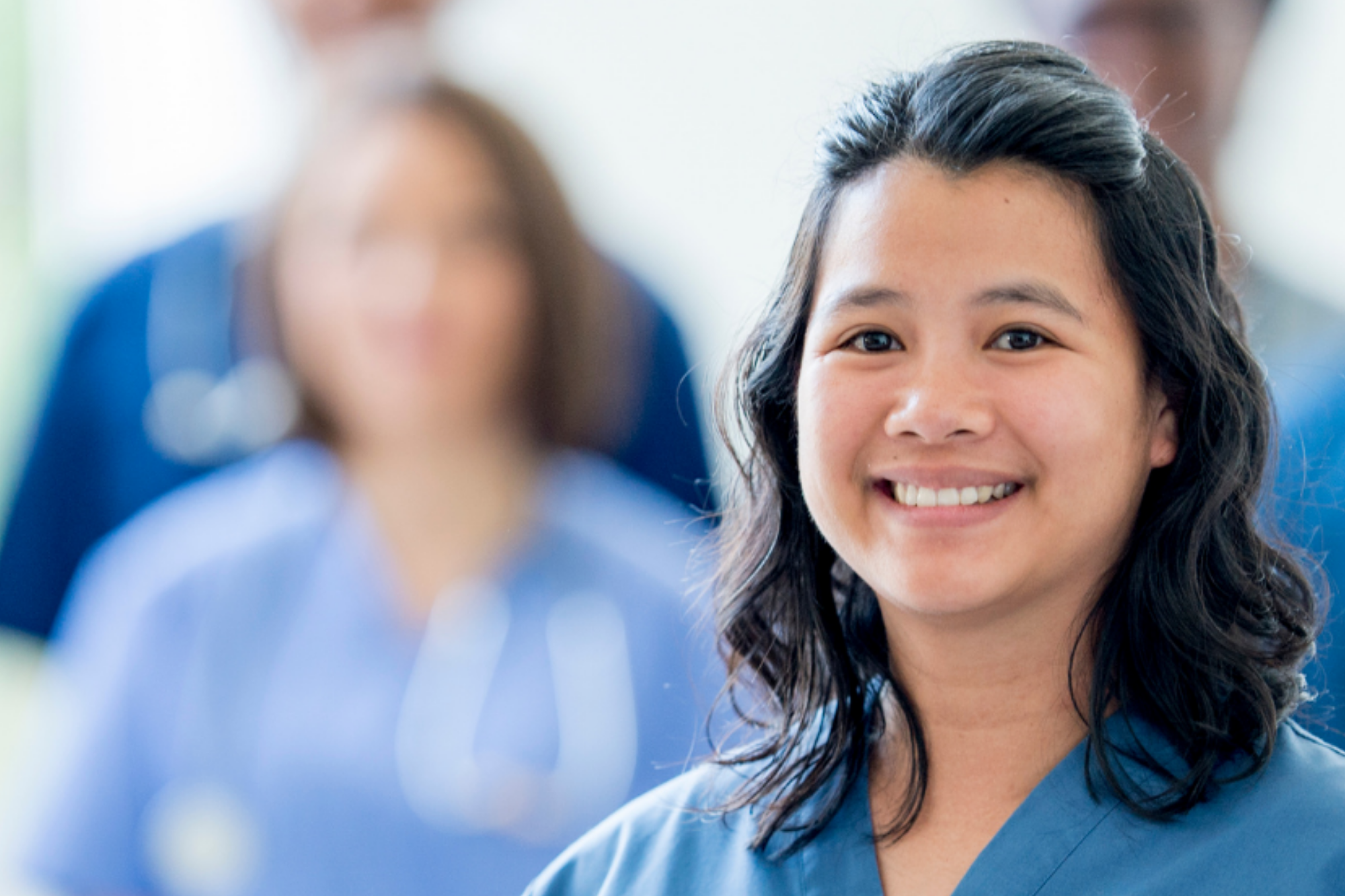 Smiling Female Healthcare Worker | Medical Imaging Services | FMIG